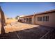 Large backyard, featuring a patio and rock landscaping at 9408 Forest Edge Ave, Las Vegas, NV 89149