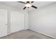 Bright bedroom with ceiling fan and ample closet space at 9875 Vista Meadows Ave, Las Vegas, NV 89148