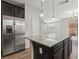 Modern kitchen with stainless steel appliances and granite countertops at 9875 Vista Meadows Ave, Las Vegas, NV 89148