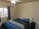 Bedroom with double bed and ceiling fan at 10046 Daybreak Dew Ct, Las Vegas, NV 89183