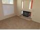 Living room with a fireplace and tile floors at 10046 Daybreak Dew Ct, Las Vegas, NV 89183