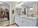 Double vanity bathroom with a walk-in closet at 10211 Starlit Canyon Ct, Las Vegas, NV 89141