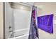 Clean bathroom with a shower/tub combo and updated fixtures at 10211 Starlit Canyon Ct, Las Vegas, NV 89141