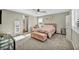 Main bedroom with plush carpet, seating area and ensuite bathroom at 10211 Starlit Canyon Ct, Las Vegas, NV 89141