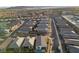 Expansive aerial view of a suburban community, displaying uniform rooftops and neatly laid out streets at 11900 Star Grass Ave, Las Vegas, NV 89138