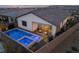 This aerial view showcases a private pool and spa nestled in a well-maintained backyard at 11900 Star Grass Ave, Las Vegas, NV 89138