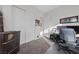 Bedroom featuring a work station, closet, and gray carpet at 11900 Star Grass Ave, Las Vegas, NV 89138