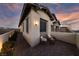 Outdoor courtyard with pavers, patio furniture, accent lighting, and drought-tolerant landscaping at 11900 Star Grass Ave, Las Vegas, NV 89138