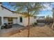 Private backyard features a mix of brick pavers and decorative rock landscaping at 1544 Tilman Ln, Boulder City, NV 89005