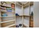 Large walk-in closet offers ample storage space and well-organized shelving at 1544 Tilman Ln, Boulder City, NV 89005