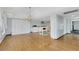 Open concept dining room with hardwood floors and kitchen view at 1808 Birch St, Las Vegas, NV 89102