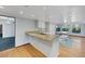 Spacious kitchen featuring granite island and hardwood floors at 1808 Birch St, Las Vegas, NV 89102