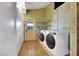 Laundry room with washer, dryer, and ample storage at 1808 Birch St, Las Vegas, NV 89102