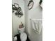 Small bathroom with toilet and shelf decor at 2130 Trebbiano Way, Las Vegas, NV 89156