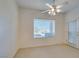 Bedroom featuring neutral carpet, a ceiling fan and outdoor access at 2192 Tiger Links Dr, Henderson, NV 89012