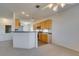 Kitchen featuring tiled floors and wood cabinets at 2192 Tiger Links Dr, Henderson, NV 89012