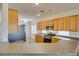 Traditional kitchen with wooden cabinets and stainless steel appliances at 2192 Tiger Links Dr, Henderson, NV 89012