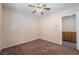 Neutral bedroom with ceiling fan and carpeted floor at 2244 Brighton Shore St, Las Vegas, NV 89128