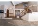 Inviting foyer featuring high ceilings, a staircase, and views of the living spaces at 2244 Brighton Shore St, Las Vegas, NV 89128