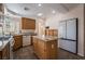 Kitchen featuring stainless steel appliances, granite countertops, and an island at 2244 Brighton Shore St, Las Vegas, NV 89128