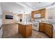 Kitchen featuring an island with granite countertops and appliances, flows into living area at 2244 Brighton Shore St, Las Vegas, NV 89128