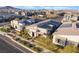 An aerial view of a modern home with desert landscaping, modern architecture, and inviting outdoor spaces at 2498 Veronella St, Henderson, NV 89044