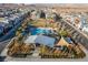 Aerial view of a community pool and playground offering a resort-style experience for residents at 2498 Veronella St, Henderson, NV 89044