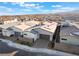 Single-story home featuring desert landscaping, a private driveway, neutral color palette, and mountain views at 2498 Veronella St, Henderson, NV 89044