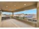 This expansive covered balcony is perfect for relaxing outdoors and taking in the stunning mountain views at 2593 Indigo Cloud Ct, Las Vegas, NV 89142