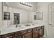 Bathroom with a dual sink vanity offering plenty of counter space and storage at 2593 Indigo Cloud Ct, Las Vegas, NV 89142