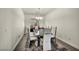 Elegant dining room features a modern table and chairs, set on a plush rug at 2593 Indigo Cloud Ct, Las Vegas, NV 89142