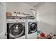 Well-equipped laundry room with modern appliances and plenty of storage space at 2593 Indigo Cloud Ct, Las Vegas, NV 89142