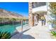 A covered dining space and views of the pool showcase this property's seamless transition from indoor to outdoor living at 2793 Red Arrow Dr, Las Vegas, NV 89135