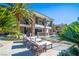 Multiple lounge chairs surround the pool and spa on the property's pool deck at 2793 Red Arrow Dr, Las Vegas, NV 89135