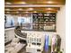 Aerial view of a foyer featuring a piano, winding staircase, and balcony with bookcase at 2793 Red Arrow Dr, Las Vegas, NV 89135