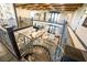 Staircase leading to an open floorplan featuring a living room, kitchen and balconies at 2793 Red Arrow Dr, Las Vegas, NV 89135