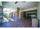 Covered patio with stone columns, iron railings, and tiled flooring, perfect for outdoor entertaining at 2793 Red Arrow Dr, Las Vegas, NV 89135