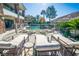 Multiple lounge chairs surround the pool and spa on the property's pool deck at 2793 Red Arrow Dr, Las Vegas, NV 89135