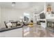 Spacious living room with fireplace, large TV, and yellow coffee table at 286 Fairmeadow St, Henderson, NV 89012