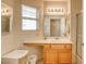 Bright bathroom featuring tile flooring, a well-lit mirror, and a glass-enclosed shower at 3353 Kylemore St # 101, Las Vegas, NV 89129