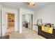 Bedroom view showcasing closet and doorway to adjoining room with kitchenette at 3353 Kylemore St # 101, Las Vegas, NV 89129