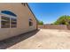 Large backyard with gravel and a block wall at 3357 Sheep Canyon St, Las Vegas, NV 89122