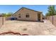 Spacious backyard with gravel and a block wall at 3357 Sheep Canyon St, Las Vegas, NV 89122