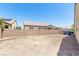 Backyard view with block wall and neighboring homes at 3357 Sheep Canyon St, Las Vegas, NV 89122