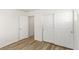 Bright bedroom with wood-look floors and spacious closet at 3357 Sheep Canyon St, Las Vegas, NV 89122