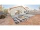 Private backyard featuring a fire pit and low-maintenance landscaping at 353 Keating St, Henderson, NV 89074