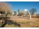 Community basketball court with hoops, benches, and a well-maintained playing surface for recreational activities at 353 Keating St, Henderson, NV 89074