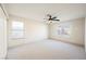 Spacious main bedroom with large windows and neutral carpet at 353 Keating St, Henderson, NV 89074