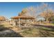 Community park featuring covered picnic area with tables and benches plus basketball court for outdoor enjoyment at 353 Keating St, Henderson, NV 89074