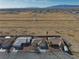 Aerial view of the neighborhood with various houses and desert landscaping at 3714 Mount Charleston Dr, Pahrump, NV 89048